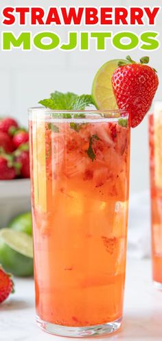 strawberry mojitos with limes and strawberries in the background, on a white table