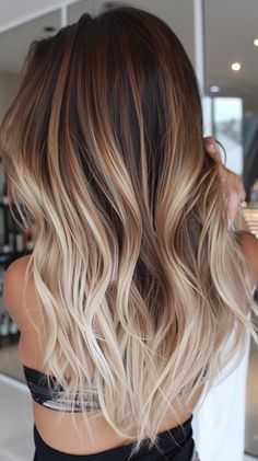 42 Latte Hair Color Ideas That Are Brewing Hot! Melt Color Hair, 6n Hair Color With Balayage, Bronde Balayage With Money Piece Curly Hair, Hair Fall Color Ideas, Medium Brown To Blonde Balayage, Tye And Dye Blond, Blonde For Neutral Skin Tone, Winter Ombre Hair, Iced Caramel Latte Hair Color