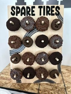 there is a sign that says spare tires with donuts in the shape of letters