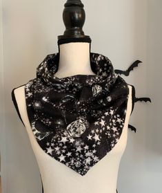 **Ready to Ship** Handmade soft 100% cotton flannel bandana style scarf. Moons and stars on a burnt black background with one metal snap. Perfect accessory to keep you warm and stylish for the fall and winter.  Easy to wear with your coat in the winter and over a sweater without the bulk of a large scarf, it's a scaled down version of a blanket scarf. Makes a wonderful gift for yourself or anyone who wants to be cozy! The finished size is approximately 27 inches in length and 15 inches wide, wear it as part of your outfit or as a scarf for those chilly outings! Easy all-day wear without the bulk of a full scarf. This scarf is: -Made of 100% soft cotton flannel in a smoke-free environment. -Machine wash delicate cold. Tumble-dry low. *Fabric may shrink in the dryer* recommend hanging to dry Casual Winter Bandana, Casual One Size Winter Bandana, Moons And Stars, Bandana Style, Scarf Jacket, Scarf Bandana, Style Scarf, Bandana Styles, Scarf Neck