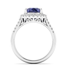 Introducing our exquisite oval blue tanzanite and diamond ring, a true embodiment of elegance and sophistication. Crafted with meticulous attention to detail, this stunning piece showcases a captivating oval-shaped blue tanzanite at its center, radiating a mesmerizing hue that captures the essence of tranquility. Surrounding the tanzanite are dazzling diamonds, meticulously set to enhance its brilliance and create a harmonious contrast. With its timeless design and impeccable craftsmanship, this Tanzanite And Diamond Ring, Tanzanite Diamond Ring, Dance Jewelry, Blue Tanzanite, Birthstone Gifts, Ring Pendant Necklace, Mens Wedding Bands, Bridal Rings, Wedding Men