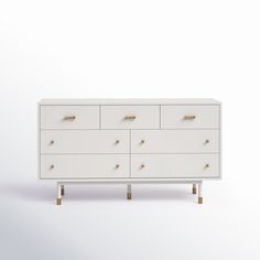 a white dresser with gold handles on it's legs and drawers, against a white background