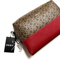 Cute Dkny Cosmetics / Toiletries Travel Bag. Pu Outer Shell Signature Pattern Metal Plaque Full Zip Across The Top With Zip Pull Tab Size: 8.5" X 6" X 2" New With Tags. Impeccable Condition. Item Comes From A Smoke Free Home. Dkny Bag, Toiletry Bag Travel, Metal Plaque, Pull Tab, Signature Logo, Travel Bag, Cosmetic Bag, Makeup Bag, Health And Beauty