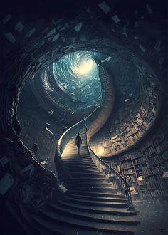 a spiral staircase leading up to a man standing on top of it in front of bookshelves