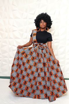 "African Print African Fashion Maxi Skirt with Pockets and Matching Headwrap or scarf. You are viewing this Fabulous and Sassy Ankara Print High Waisted Elastic Bow Skirt with Pockets. This skirt has adrinka symbols it \" gye nyame \". A known adrinka symbol meaning But God, expressing the highest . Skirts are one size, fits from a size 6 to 18 US Standard size. Measurement are 42\" to 43\" long. Also comes with a Matching Head Wrap measurement are 10\" wide and 60\" long. Happy shopping! View o African Skirts For Women Ankara, Ankara Skirt Styles High Waist, African Skirts For Women, African Skirts High Waist, Adrinka Symbols, Ankara Maxi Skirt, Dashiki Skirt, Ankara Skirt Styles, African Maxi Skirt