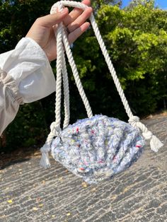 📦 Free Shipping over $35 🧶Hand crocheted by me, Double sided seashell purse 🌊  Absolutely loving this design!! Added magnet closure for extra security, Sparkles in the sun and holds great shape!✨ Finished off with a thick cotton crossbody strap, reminds me of the ocean life 🌊  📏 size: 8.5" x 6.5" x 1" 📥DM to order, all items custom available, takes special orders ♻️ Sustainability  My yarns are sustainably sourced from second-hand marketplaces, often coming from people's excess supplies or inherited collections. By repurposing these yarns, I keep them out of landfills, give them a second life, and some times able to support families dealing with loss. 🧶 Unique Custom Mix I custom blend different strands and threads to create unique colors and textures. This also reinforces aged wool Seashell Purse, Dealing With Loss, Field Bag, Colorful Crochet, Crochet Bags, Bag Handmade, Ocean Life, Life Size, Crochet Ideas