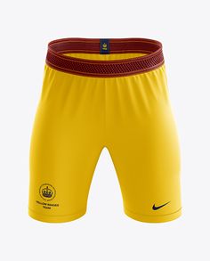 the nike soccer shorts are yellow and red