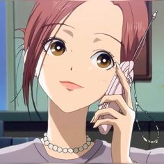 an anime character talking on a cell phone