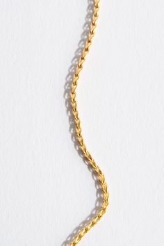 The Small Solo Chain features single woven links joined by a Mycenae-inspired fibula clasp, a.k.a. the first safety pin. 22K Yellow Gold Made in NYC Chain Loop, Safety Pin, 22k Gold, A K, The First, Yellow Gold, Chain, Yellow, Gold