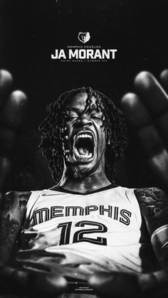 a black and white photo of a basketball player with his mouth open