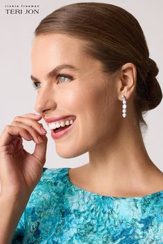 These stunning crystal-embellished drop earrings feature five unique shapes, each adorned with sparkling crystals. The cascading design creates a dynamic and eye-catching look, perfect for adding luxury to any outfit. Color: Silver Crystal Push Back Closure Pattern: Rectangle, Circle, Square, Circle, Heart Sparkling Stones Teardrop Earrings For Evening, Sparkling Stones Chandelier Drop Earrings, Faceted Crystal Drop Earrings For Wedding, Teardrop Faceted Crystal Earrings For Formal Occasions, Modern Diamond-shaped Earrings For Formal Events, Crystal Linear Earrings With Sparkling Stones, Modern Silver Teardrop Crystal Earrings, Teardrop Crystal Embellished Earrings, White Crystal Chandelier Earrings