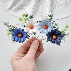 This White and blue flower hair pins wedding , of artificial flowers This a beautiful and delicate hair accessory for brides and a nice gift to the bridesmaids On the wedding day, every bride wants to look fantastic. This flower hair piece , will be a magical addition to your look on your happiest day. This will emphasize the ease of your image. The comb is very conveniently attached to the hair and fits in with any hairstyle. -Material- artificial pearl and artificial greenery -Colors- white, d Flower Hair Pins Wedding, Flower Hair Piece, Hair Pins Wedding, Flower Hair Pins, Flower Hair Pieces, Floral Hair Pins, White And Blue Flowers, Bridal Hair Piece, Artificial Greenery