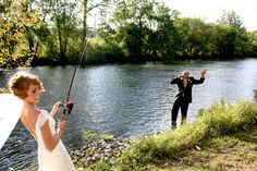 a bride and groom are fishing on the river