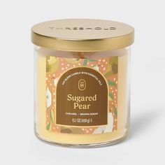 a jar of sugared pear candle on a white background