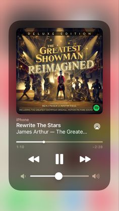 an iphone screen with the music player on it's side and text that reads greatest showman remagined