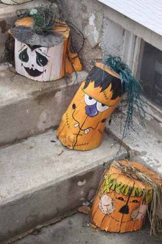 three pumpkins painted to look like cartoon characters