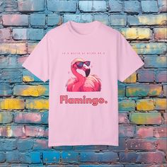 In a world of birbs.. i mean birds... be a Flamingo. Just be yourself! Made 100% with ring-spun cotton. The soft-washed, garment-dyed fabric brings extra coziness to your wardrobe while the relaxed fit makes it an excellent daily choice. The double-needle stitching throughout the tee makes it highly durable while the lack of side-seams helps the shirt retain its tubular shape.   Features pre-shrunk cotton for size retention and a signature sewn-in twill label. Made using 100% US cotton that is ethically grown and harvested. Flamingo T Shirt, Be A Flamingo, Just Be Yourself, Animal Graphic Tee, Animal Graphic, Just Be You, Dyed Fabric, Funny Animal, T Shirt Funny