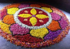 a circular flower arrangement on the ground