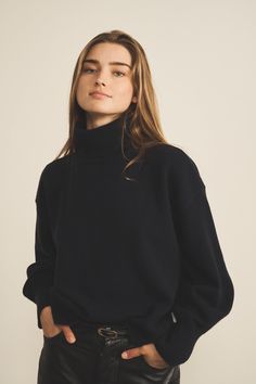 This new loose-fitting piece with puffed sleeves and a turtleneck is a wardrobe essential. Slightly cropped, this sweater goes equally well over a dress or tucked into jeans to show off your subtle waist. Stole Scarf, Sleeveless Cardigan, Union Made, Cardigan Top, Puffed Sleeves, Shirt And Pants, Spring Collection, Midnight Blue, Turtleneck Sweater