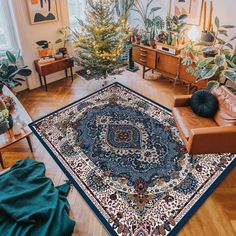 a living room filled with furniture and christmas trees