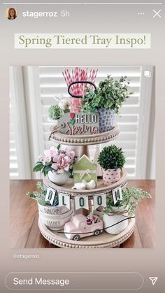 a three tiered tray with flowers and other items on it that say spring tired try inspo