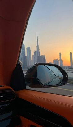 a view of the city from inside a car