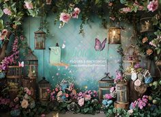 a backdrop with flowers, birds and cages