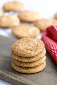 soft and chewy snickkered cookies on a cutting board with text overlay