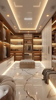 a walk in closet with marble flooring and white walls, lighted by recessed lights