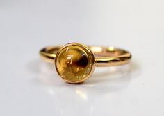 Natural Citrine Gold Ring - Citrine Gold Ring - citrine engagement ring - Promise Ring - Gift for Her  Stone Size  - 8 mm Round        9K,10K,14k18K,22K Solid fine Gold Band Width - 2.40 MM Gold Colour Options -  Yellow Gold, White Gold, Rose Gold  Ready to Ship 1-2 weeks Customization is available, I also can make it with 9k,10k,14k,18k,22k solid gold (white or rose), and diamond accent stone, just feel free to contact me.  *    PACKAGING: The Ring will be delivered in its own jewelry box. Gift Citrine Engagement Ring, Citrine Ring Engagement, Rings Promise, Promise Ring Gift, Citrine Ring, Natural Citrine, Gold Colour, Ring Promise, Box Gift