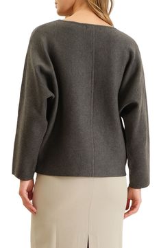 This slouchy sweater is designed with a boatneck and makes a sophisticated staple to add to your cozy collection. 24" length (size Small) Boatneck Long sleeves 88% polyester, 12% nylon Hand wash, dry flat Imported Cozy Gray Tops For Workwear, Cozy Gray Top For Workwear, Casual Winter Sweater With Boat Neck, Casual Boat Neck Sweater For Winter, Casual Boat Neck Winter Sweater, Versatile Oversized Sweater For Workwear, Oversized Versatile Sweater For Work, Relaxed Fit Boat Neck Tops For Fall, Wool Funnel Neck Tops For Fall