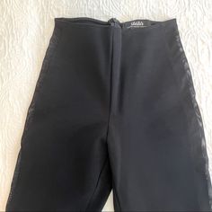 Nwot Black Skinny Pant With Mesh Panels. Legging Like Fit But A Thicker Fabric. Dress Up Or Dress Down For Casual Look. Size Xs Back Zipper No Waist Band Never Worn. Nwot Fabric Stretches. Ankle Length. Elegant Tight Pants For Party, Elegant Party Pants, High Waist Bottoms With Back Zipper For Night Out, High-waist Bottoms With Back Zipper For Night Out, Chic Fitted Bottoms With Back Zipper, Fitted High Waist Bottoms With Back Zipper, Party Bottoms With Back Zipper And Stretch, Fitted Pants For Date Night, Black Party Bottoms With Back Zipper