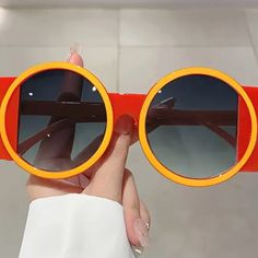 Mod Color Block Fashion Decorative Shades For Costume Party Club Fun Orange Tinted Sunglasses, Retro Yellow Sunglasses For Vacation, Fun Orange Plastic Sunglasses, Trendy Yellow Round Frame Sunglasses, Yellow Plastic Sunglasses For Vacation, Retro Yellow Plastic Sunglasses, Yellow Retro Plastic Sunglasses, Retro Orange Sunglasses For Vacation, Fun Red Sunglasses For The Beach