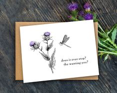 a card that says, does it ever stop? the wanting you are with purple flowers