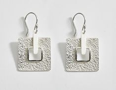 Graceful contemporary design in textured 950 Sterling silver. Artsy, yet Classy!Earring size hanging 1 3/8 inch.Gift boxed. Affordable Modern Sterling Silver Jewelry, Cheap Modern Silver Jewelry, Modern Silver Jewelry Simple, Contemporary Jewellery Earrings Unique, Affordable Modern Sterling Silver Earrings, Luxury Textured Earrings, Modern Silver Jewelry Macy's, Cheap Modern Silver Earrings, Luxury Textured Modern Earrings