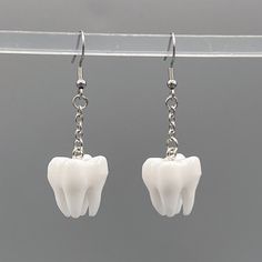 These replica human molar teeth dangle on a chain measuring in total about 1.25 inches long. Make your day spooky, kooky, silly and fun with these light weight plastic teeth. Molar Tooth, Stroudsburg Pa, Chain Earrings, Make Your Day, Jewelry Earrings Dangle, Dangle Earrings, Jewelry Earrings, Make Your, Drop Earrings