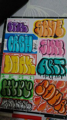 graffiti written in different colors on a piece of paper