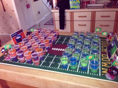 a football field table with cups on it