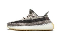 The adidas Yeezy Boost 350 V2 “Zyon” is a Summer 2020 release that continues the model’s association with wearable, neutral-toned colorways.  The Primeknit upper takes on a marbled black, white, and grey look that can sync up with just about any outfit thrown its way.  A solid black woven side stripe spans from heel to toe to contrast the appearance.  Beige cotton laces and a grey liner provide additional styling.  The “Zyon” colorway omits the heel tab found on many previous iterations of the Y Yeezy Collection, 350 Boost, Baskets Adidas, Adidas Boost, Yeezy Boost 350 V2, Nike Dunk High, Yeezy 350, Air Jordan 3, Stadium Goods