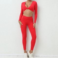 Red Vara Fitness Set | Daniki Limited Casual High Stretch Activewear For Pilates, Casual Stretch Activewear For Pilates, Casual Elastane Yoga Pants For Gym, High Stretch Casual Activewear For Pilates, Red Elastane Activewear For Gym, Red Elastane Activewear For Sports, Red Fitted Elastane Activewear, Red High Stretch Long Sleeve Activewear, Sporty Red Leggings For Pilates