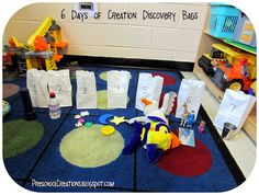 a room filled with lots of toys and paper bags