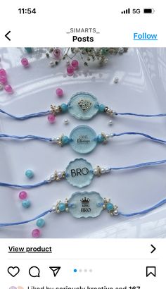 three bracelets with beads and charms on them