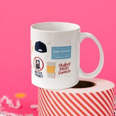 On a hot pink background sits a mug atop a red and white striped roll of packing tape with white crinkle and big, colorful confetti scattered around. There are mini disco balls. This Gilmore Girls inspired white mug has colorful illustrations from the show. It says STARS HOLLOW FOUNDED in 1774. There is a navy backwards cap, a to-go coffee cup, a cell phone that has red circle and slash on top that says NO CELL PHONES and it also says Friday NIGHT Dinners. Digital Stationary, Candle Cards, Kids Bath, Birthday Thank You, Gilmore Girls, Love Is All, To Miss, Corporate Gifts, Custom Clothes