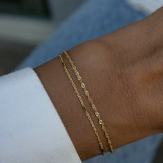 Elevate your style with this Delicate Bracelet Set, featuring two chic and minimalist bracelets. Perfect for everyday wear, these elegant pieces add a touch of sophistication whether worn together or separately. A must-have set for effortless, modern style! Includes Set of 2 Bracelets! Material: We use a Thick plating of 14k Gold or Rhodium over 925 Sterling Silver Available Sizes: 5.5" (Best for Kids), 6.25", 6.75", 7" or 7.5" + .5" Ext Closure: Lobster Clasp Closure Nickel-free and hypoallerge Chic Bracelet, Gold Armband, Dainty Bracelet, Classy Jewelry, Jewelry Lookbook, Minimalist Bracelet, Dainty Bracelets, Saint Petersburg, Girly Jewelry