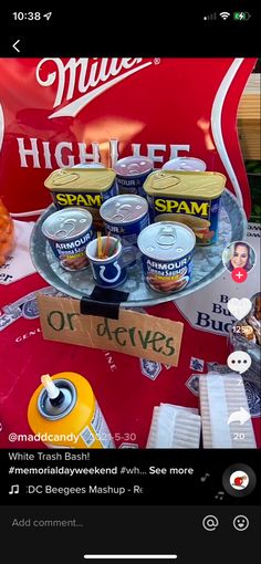 an image of some food and drinks on a table in front of a sign that says high life spam