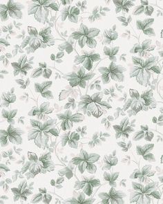 a green and white wallpaper with leaves on it