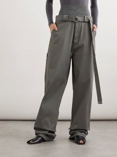 ALAÏA Belted jersey-paneled cotton-blend twill pants | NET-A-PORTER Chic Cotton Bottoms With Belt Detail, Belted Straight Leg Cotton Bottoms, Belted Straight Leg Cotton Pants, Belted High-waisted Cotton Pants, Belted Cotton Pants For Fall, High-waisted Belted Cotton Pants, Cotton Wide Leg Pants With Belt, Belted Cotton Trousers, Belted Cotton Pants With Tapered Leg