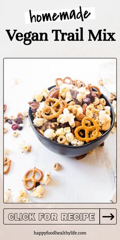 the recipe for homemade vegan trail mix in a bowl with pretzels and nuts