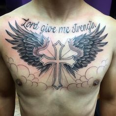 a man with a cross and wings on his chest that says, lord give me strength