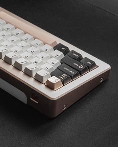 a computer keyboard sitting on top of a table